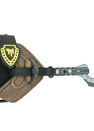 Wrist Strap Style ReleaseSpring Tensioned Sleeve Exposing Hidden Trigger (5 lbs -30 lbs Adjustable)Adjustable Trigger TravelPull Through Style FunctionalityNylon Webbing attachment on Buckle Strap (Similar to Patriot Flex)